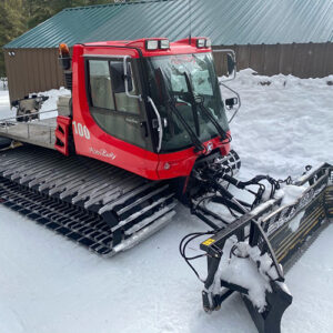 snowcat with plow