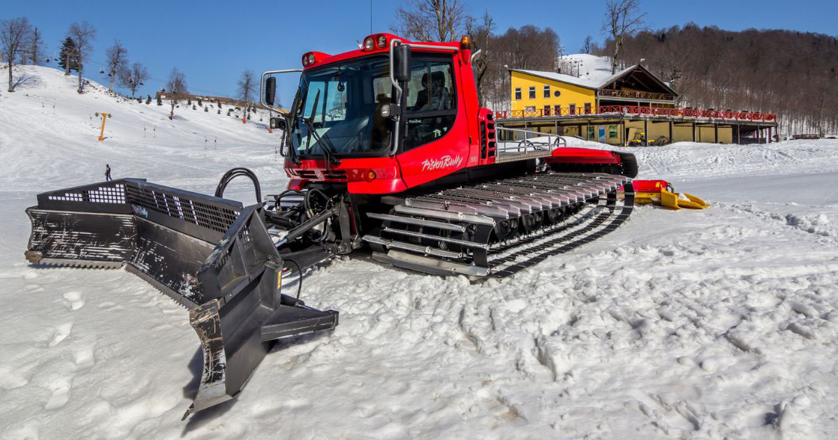 PistenBully snowcat at ski resort during winter grooming operations